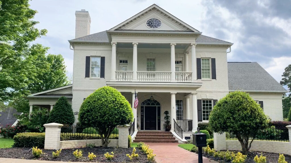 White brick home in 12 Oaks, Holly Springs NC