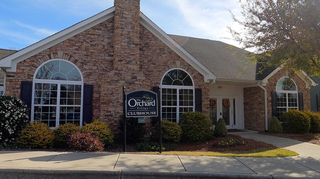 The Orchard Villas in Apex, North Carolina has a clubhouse, heated pool, bocce court, and putting green.