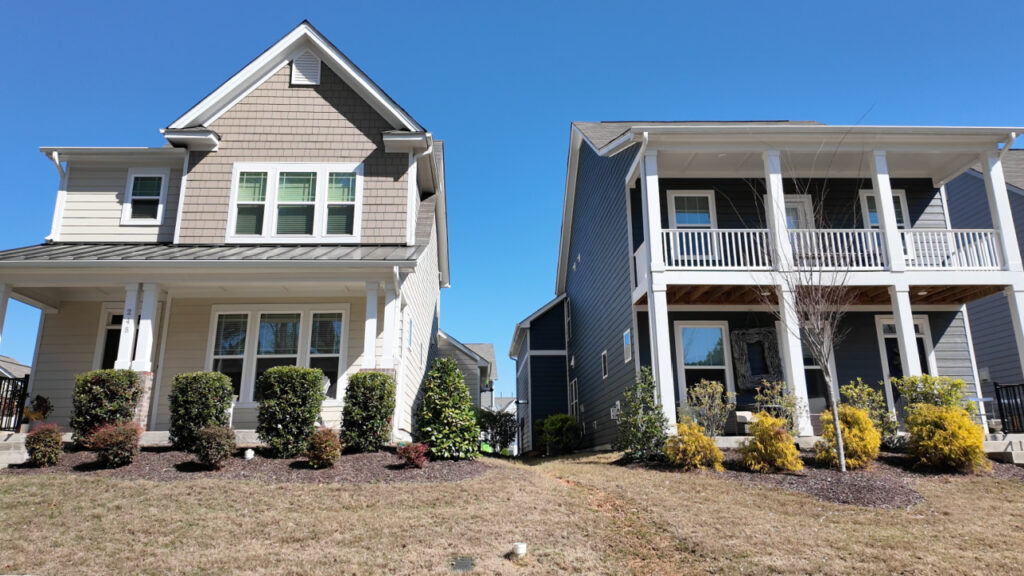 Double front porches and shaker siding in 2018 Market Holly Springs NC