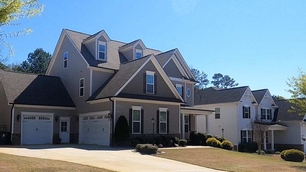 Large home in Logans Manor Holly Springs NC with 3 car garage.