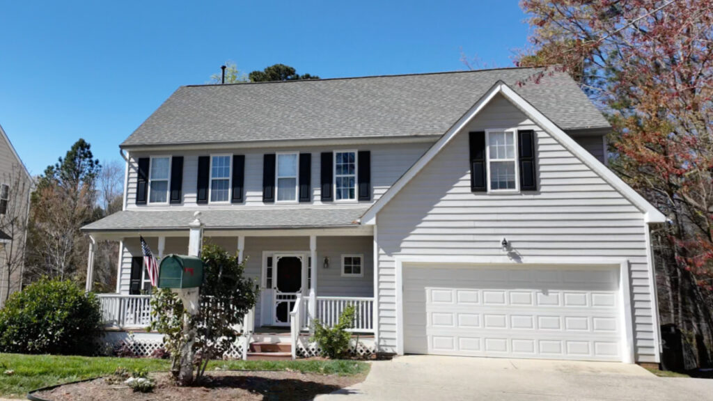 Home with front porch in Oak Hall subdivision, Holly Springs NC