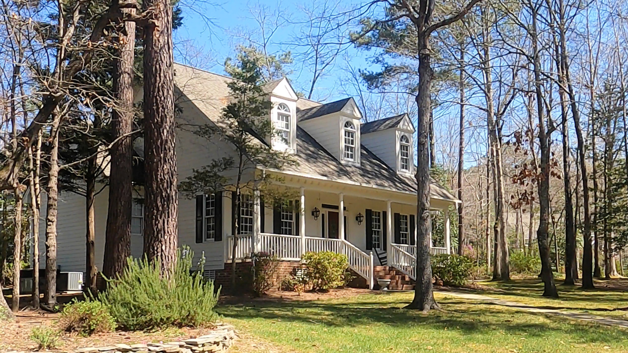 Luxury Cape Cod architecture in Sunset Lake Village Holly Springs NC