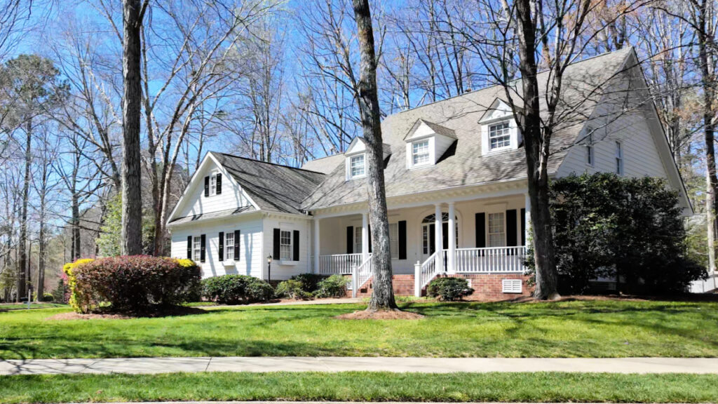 White Low Country style home in Sunset Lake Village, Holly Springs NC