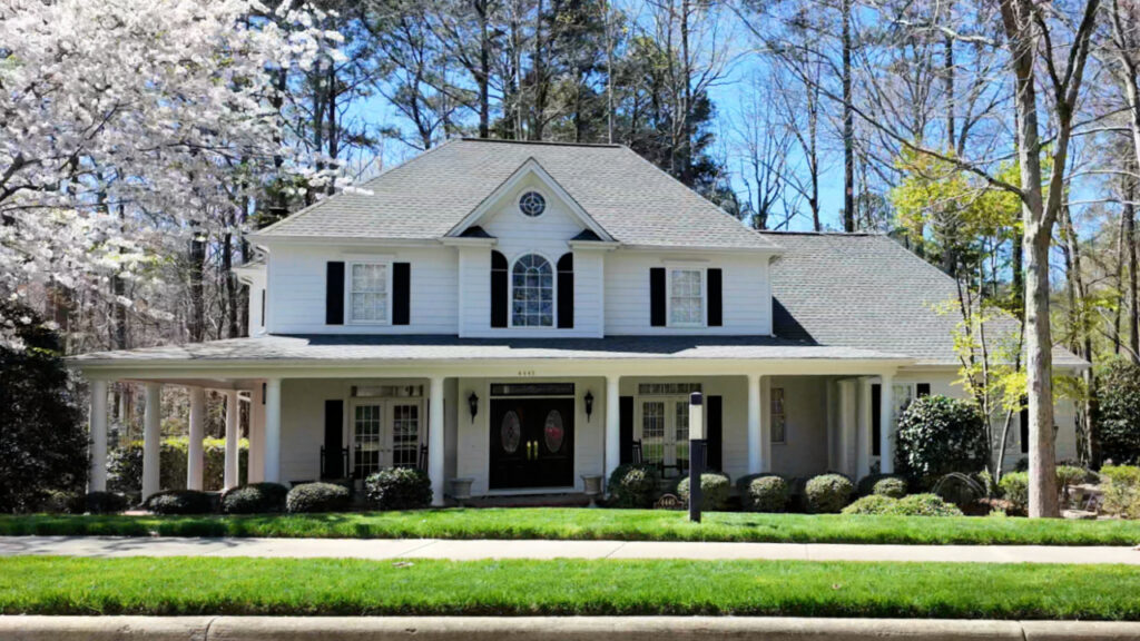 Traditional home with front porch in Sunset Lake Village