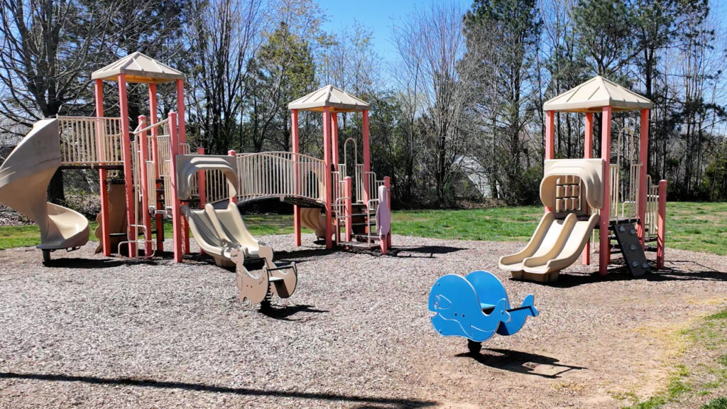 Playground and open field in Sunset Oaks